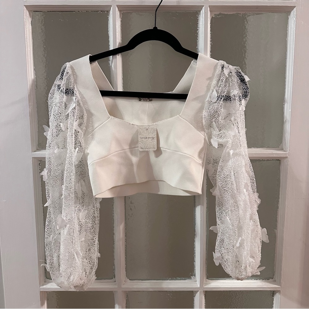 Free people flutter by top